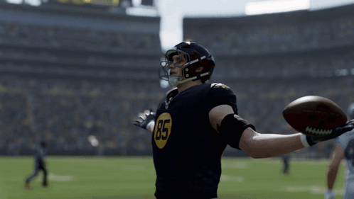 A Football Player With The Number 85 On His Shirt GIF