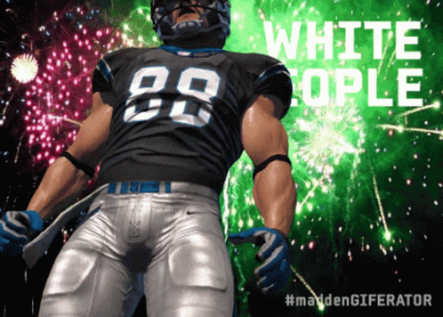 A Football Player With The Number 89 On His Jersey Stands In Front Of Fireworks GIF
