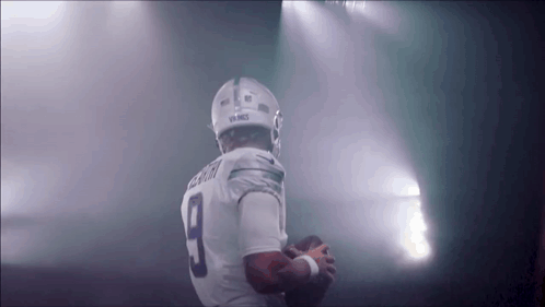A Football Player With The Number 9 On His Shirt GIF