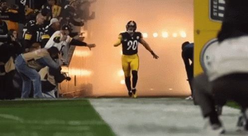 A Football Player With The Number 90 On Their Jersey GIF