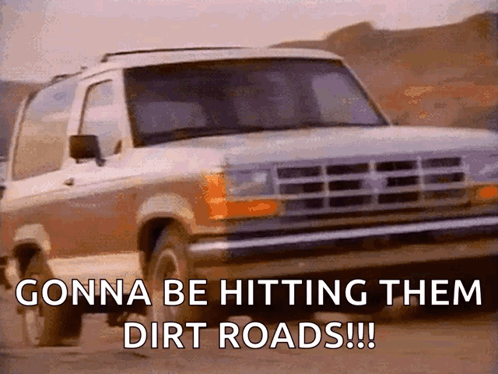 A Ford Bronco Is Driving Down A Dirt Road With The Caption " Gonna Be Hitting Them Dirt Roads !!! " GIF