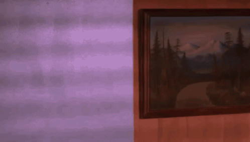 A Framed Painting Of A Mountain Landscape On A Purple Wall GIF