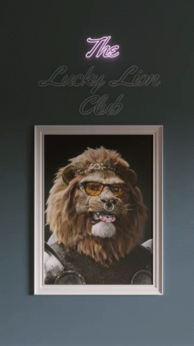 A Framed Picture Of A Lion With Glasses And A Neon Sign That Says The Lucky Lion Club Above It GIF