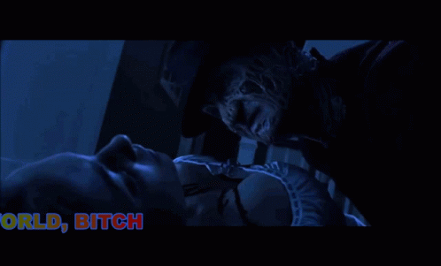 a freddy krueger kissing a woman with the words welcome to my world bitch below him