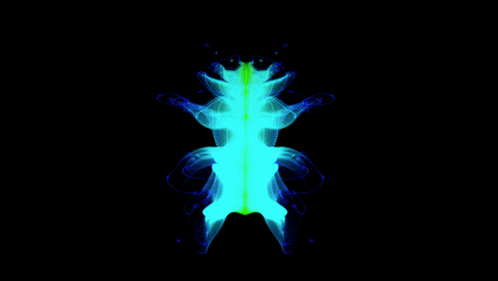 A Frog 'S Skeleton Is Glowing Blue And Green In The Dark GIF