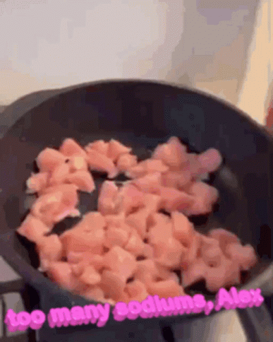 A Frying Pan Filled With Chopped Chicken And The Words " Too Many Sodium Alex " GIF