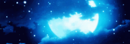 A Full Moon In A Dark Blue Sky With Stars GIF