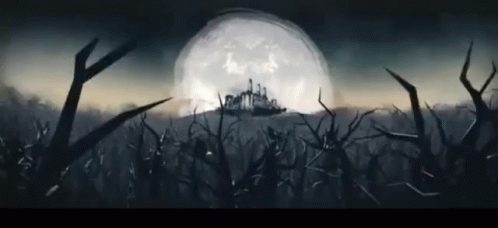 A Full Moon Is Behind A Castle In The Distance GIF