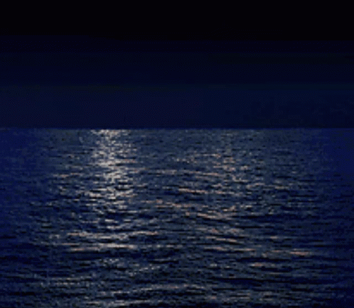 A Full Moon Is Reflected In The Water GIF