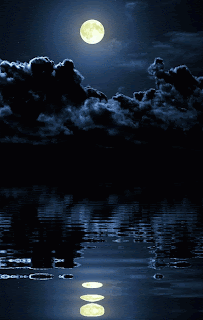A Full Moon Shines Brightly Over A Body Of Water GIF
