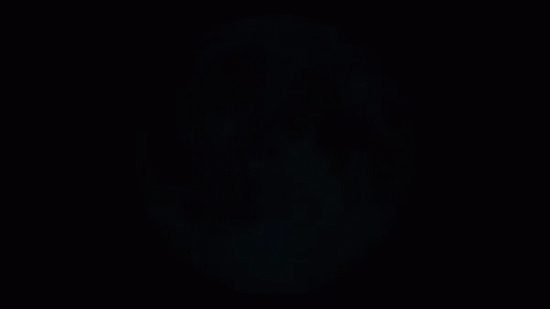 A Full Moon With A Black Background Is Shown GIF