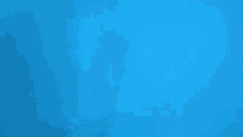 A Fur Coat Is Against A Blue Background With The Word Baller GIF