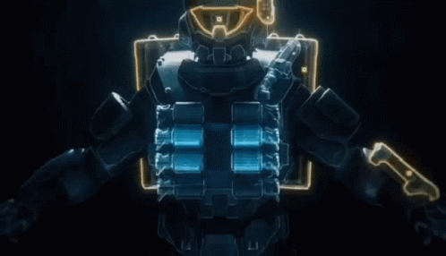A Futuristic Soldier With A Glowing Helmet And A Glowing Vest GIF