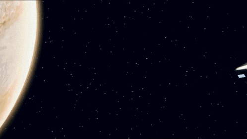 A Futuristic Vehicle Is Flying Through The Air With Smoke Coming Out Of It GIF