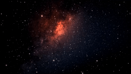 A Galaxy In The Night Sky With A Red Center GIF