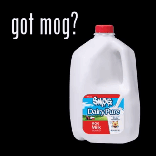 A Gallon Of Smog Dairy Pure Milk Is Sitting On A Black Background GIF