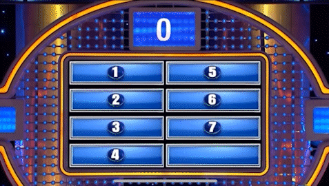 A Game Show Is Being Played On A Stage With A Scoreboard That Says 0 On It . GIF
