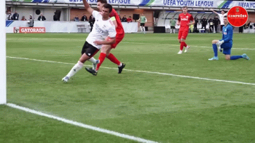 A Gatorade Ad Can Be Seen In The Background Of This Soccer Game GIF