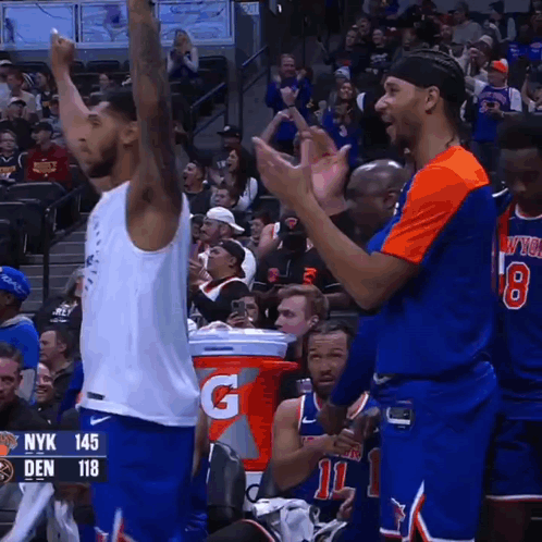 A Gatorade Bucket Sits In Front Of A Basketball Player GIF
