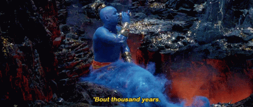 A Genie Says " Bout Thousand Years " While Sitting On A Rock GIF
