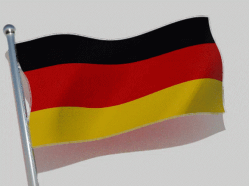 A German Flag Is Waving In The Wind Against A White Background GIF