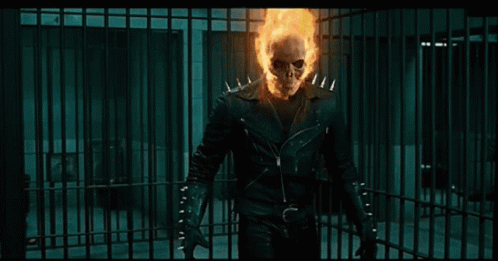 A Ghost Rider Is Holding A Gun And Saying " You Innocent " GIF