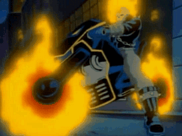 A Ghost Rider Is Riding A Motorcycle With Flames Coming Out Of It GIF