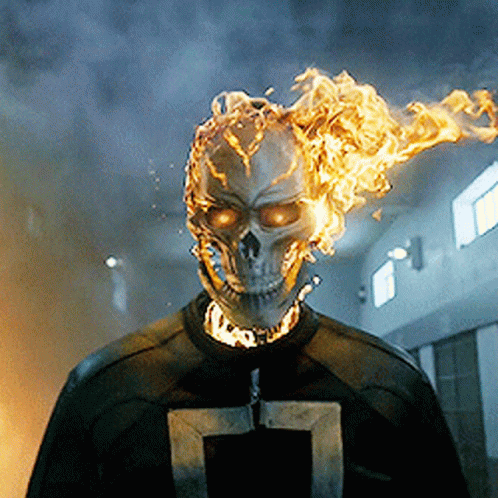 A Ghost Rider With A Skull On His Head GIF