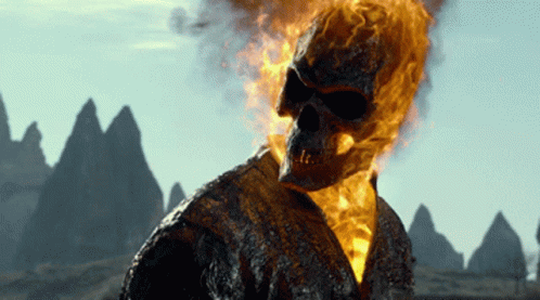 A Ghost Rider With Flames Coming Out Of His Skull GIF