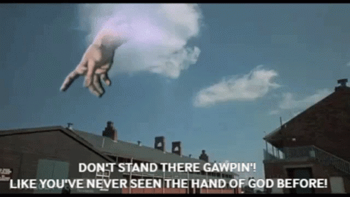 A Giant Hand Is Flying Through The Air With The Words " Don T Stand There Gawpin " GIF