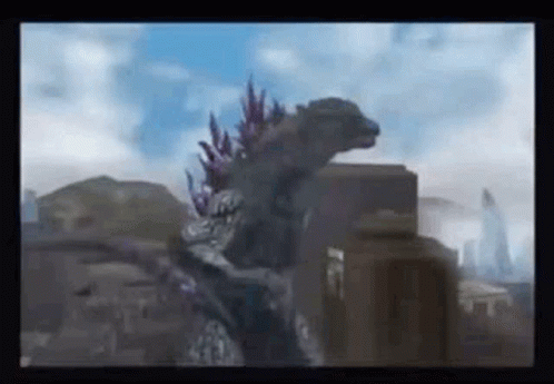A Giant Monster Is Standing On Top Of A Building . GIF