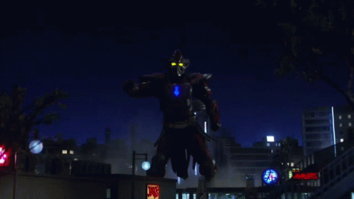 A Giant Robot Is Standing In Front Of A Mcdonald 'S Restaurant GIF