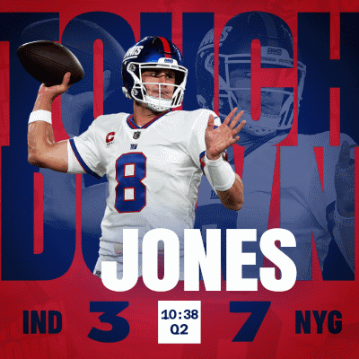 A Giants Football Player Named Jones Is Throwing A Ball GIF