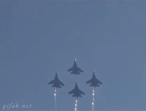 A Gif From Gifak.net Shows A Plane Flying Through The Air GIF