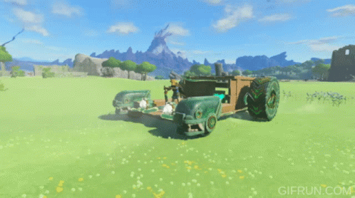 A Gif From Gifrun.com Shows A Green Car In A Field GIF