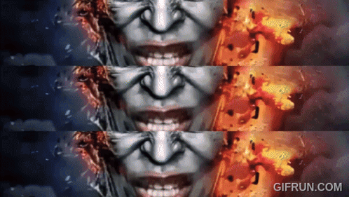 A Gif From Gifrun.com Shows A Woman 'S Face And Fire GIF