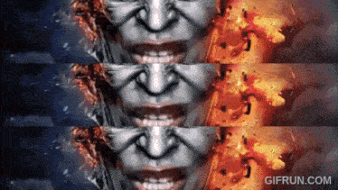 A Gif From Gifrun.com Shows A Woman 'S Face With Fire Coming Out Of Her Mouth GIF