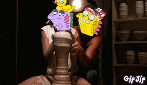 A Gif Of A Man And Woman Making A Pot With Cartoon Faces On Them GIF