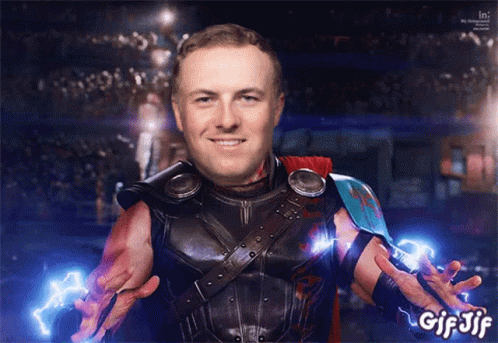A Gif Of A Man Dressed As Thor With Lightning Coming Out Of His Hand GIF
