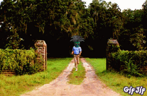A Gif Of A Man Walking Down A Dirt Road With The Words Gif Jif At The Bottom GIF