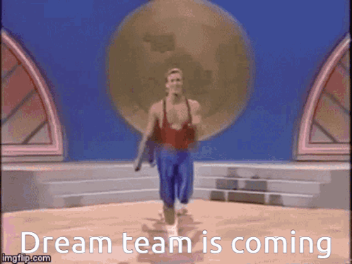 A Gif Of A Man Walking With The Words Dream Team Is Coming GIF