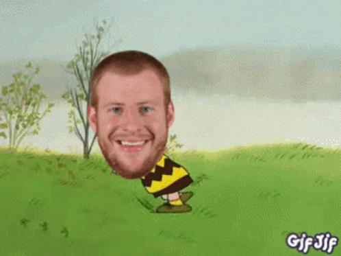 A Gif Of A Man With A Beard And A Charlie Brown Costume GIF