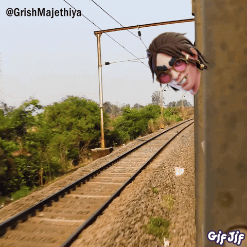 A Gif Of A Person Peeking Out Of A Train With The Words Gif Jif Below GIF