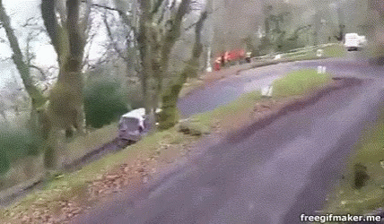 A Gif Of A Person Riding A Bike Down A Road With The Url Freegifmaker.me GIF