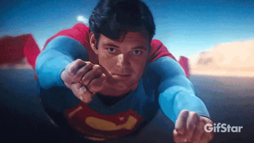 A Gif Of Superman Flying Through The Air GIF
