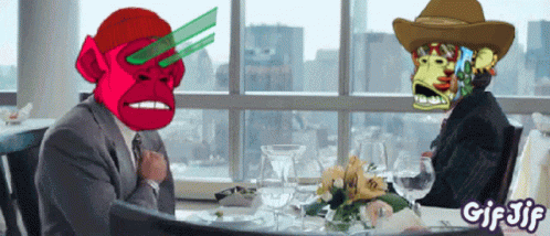 a gif of two monkeys sitting at a table with the words gif jif on the bottom