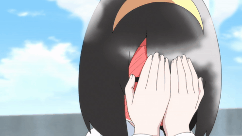 A Girl Covering Her Face With Her Hands In A Cartoon GIF