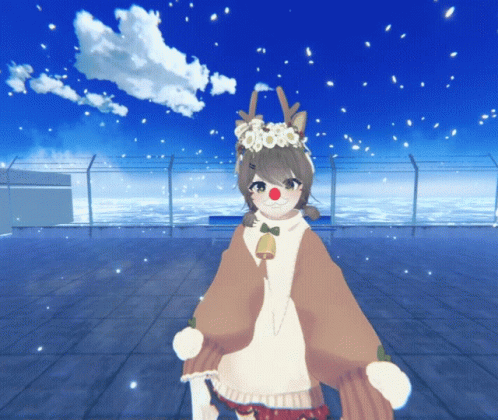 a girl dressed as a reindeer with a bell on her shoulder