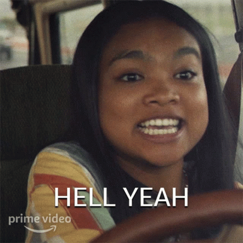 A Girl Driving A Car With The Words Hell Yeah On The Bottom GIF