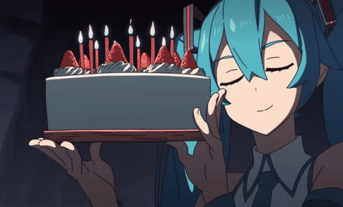 A Girl Holding A Cake With Candles On It GIF